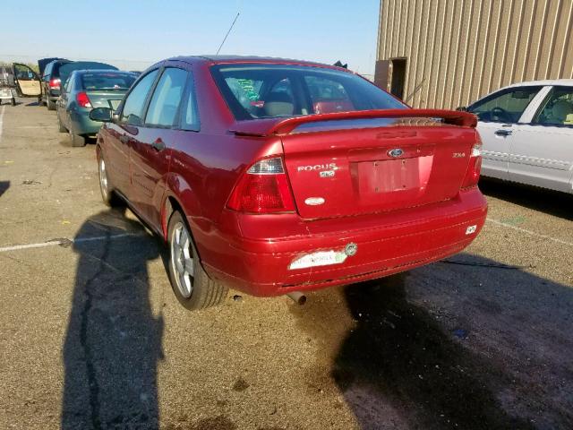 1FAHP34N85W284722 - 2005 FORD FOCUS ZX4 RED photo 3