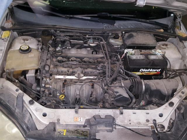 1FAFP34N65W251127 - 2005 FORD FOCUS ZX4 SILVER photo 7