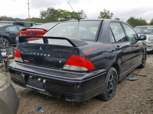 JA3AJ86E32U020143 - 2002 MITSUBISHI LANCER OZ BLACK photo 4