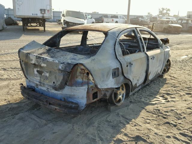 KL1TD5DE0AB127641 - 2010 CHEVROLET AVEO LS BURN photo 4