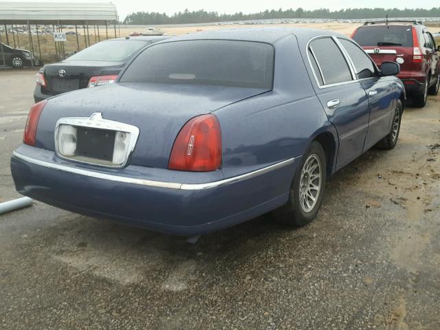 1LNHM82W2YY806180 - 2000 LINCOLN TOWN CAR S BLUE photo 4