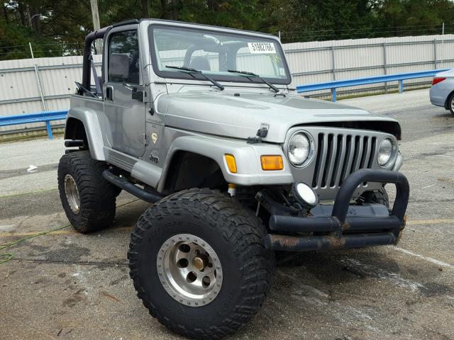 1J4FA49S41P302719 - 2001 JEEP WRANGLER / GRAY photo 1