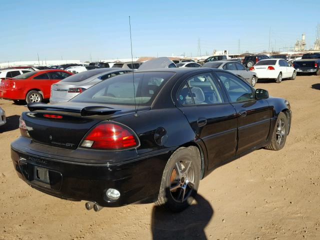 1G2NW52E31C177785 - 2001 PONTIAC GRAND AM G BLACK photo 4