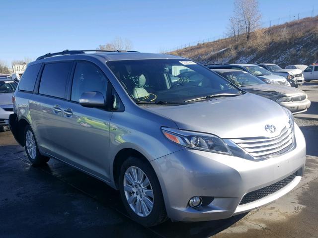 silver toyota minivan