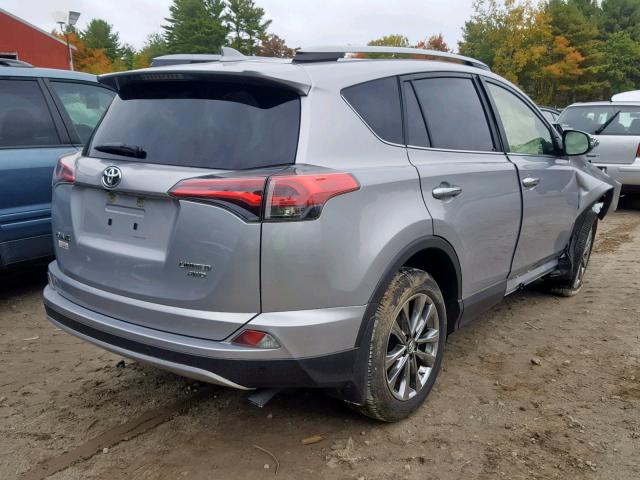 JTMDFREV7JJ216030 - 2018 TOYOTA RAV4 LIMIT SILVER photo 4