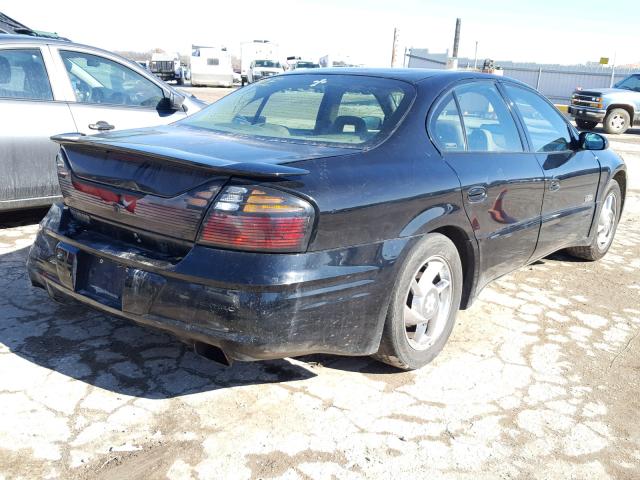 1G2HZ5416Y4205243 - 2000 PONTIAC BONNEVILLE BLACK photo 4