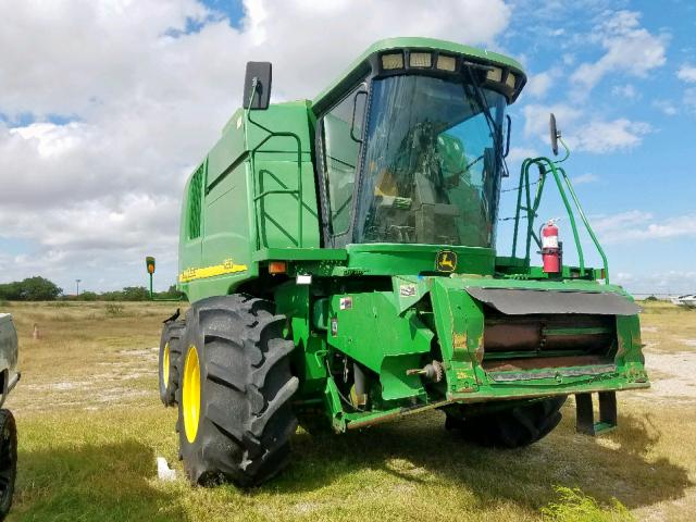 H09550W700301 - 2002 JOHN DEERE COMBINE GREEN photo 1