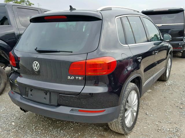 WVGAV3AX1EW540301 - 2014 VOLKSWAGEN TIGUAN S BLACK photo 4