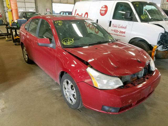 1FAHP36N79W252587 - 2009 FORD FOCUS SES RED photo 1