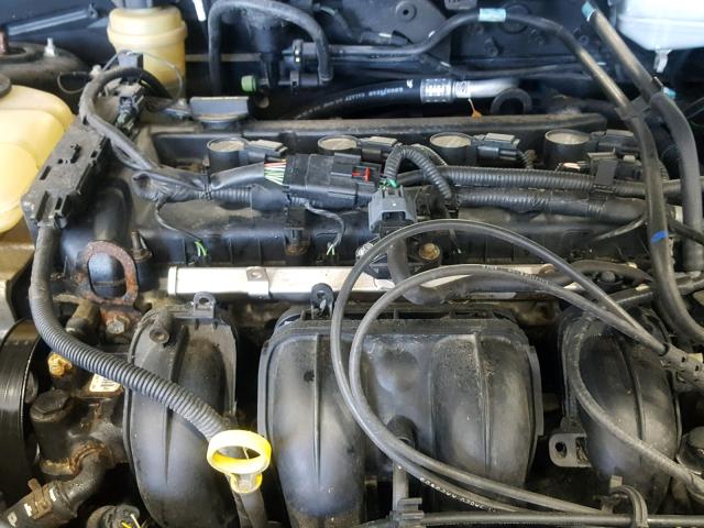 1FAFP34N56W127979 - 2006 FORD FOCUS ZX4 BLACK photo 7