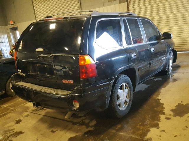 1GKDT13S722100779 - 2002 GMC ENVOY BLACK photo 4