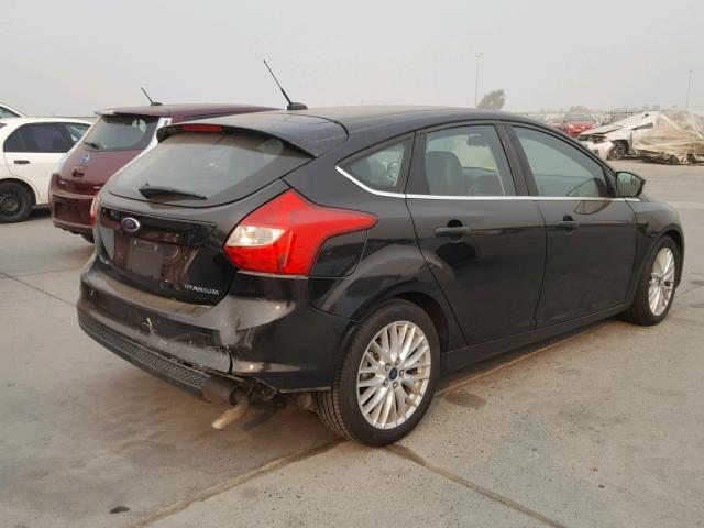 1FADP3N23EL375319 - 2014 FORD FOCUS TITA BLACK photo 4