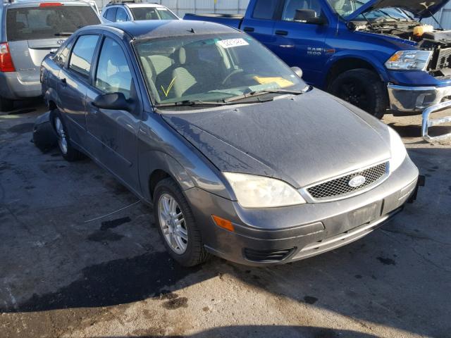 1FAFP34N27W121588 - 2007 FORD FOCUS ZX4 GRAY photo 1