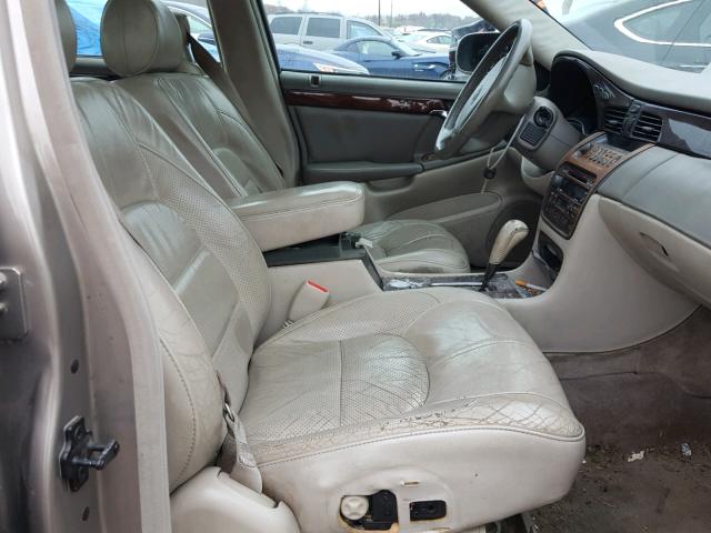 1G6KF5795YU246106 - 2000 CADILLAC DEVILLE DT TAN photo 5