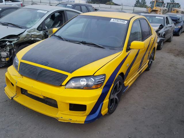 JA3AJ86E82U005458 - 2002 MITSUBISHI LANCER OZ YELLOW photo 2