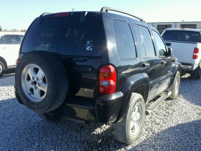 1J4GL58K02W143307 - 2002 JEEP LIBERTY LI BLACK photo 4