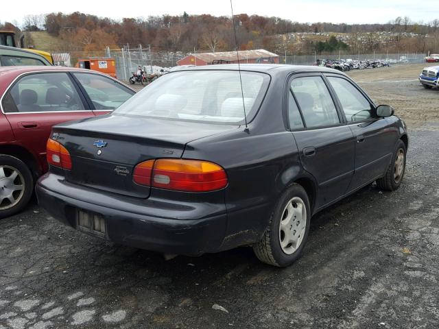 1Y1SK5282XZ421996 - 1999 CHEVROLET GEO PRIZM BLACK photo 4