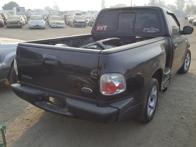 2FTZF07372CA74467 - 2002 FORD F150 SVT L BLACK photo 4