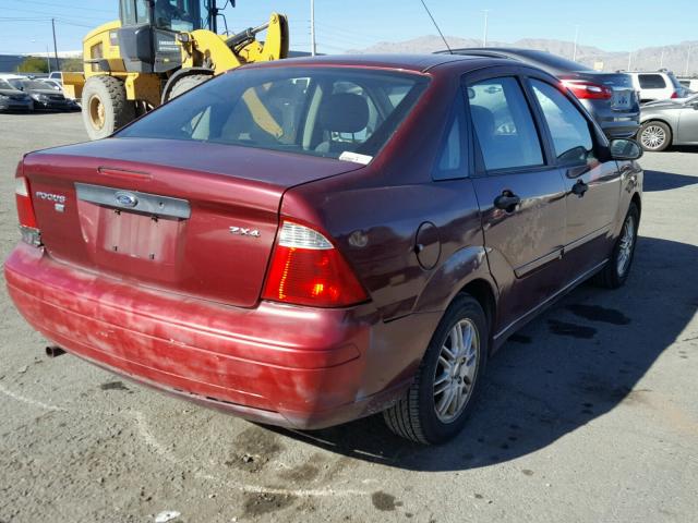 1FAFP34N06W115433 - 2006 FORD FOCUS ZX4 MAROON photo 4