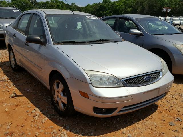 1FAFP34N75W316891 - 2005 FORD FOCUS ZX4 GRAY photo 1