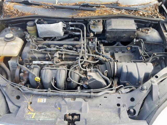 1FAFP34N25W240187 - 2005 FORD FOCUS ZX4 BLACK photo 7