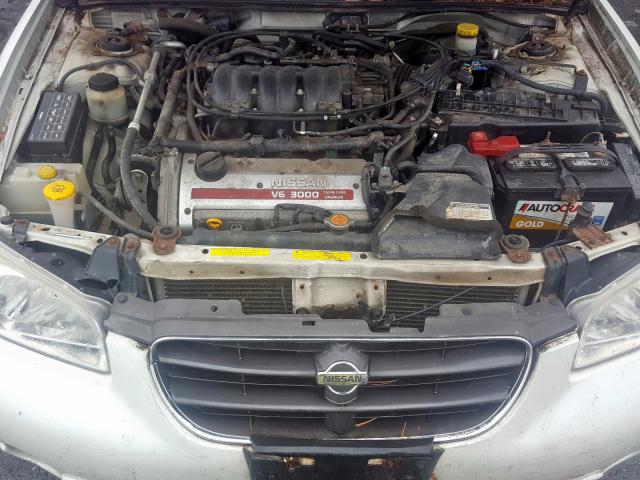 JN1CA31D5YT710585 - 2000 NISSAN MAXIMA GLE WHITE photo 7