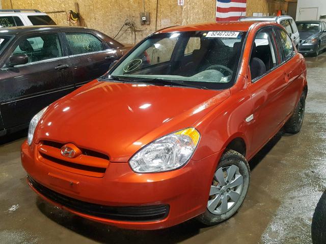 KMHCM36C19U129953 - 2009 HYUNDAI ACCENT GS ORANGE photo 2