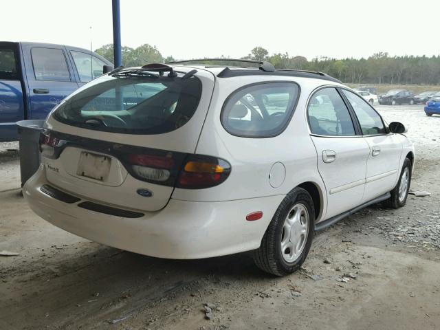 1FALP57U0VA173023 - 1997 FORD TAURUS GL WHITE photo 4