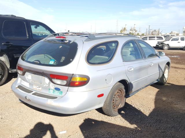 1FALP57U6VG134465 - 1997 FORD TAURUS GL GRAY photo 4