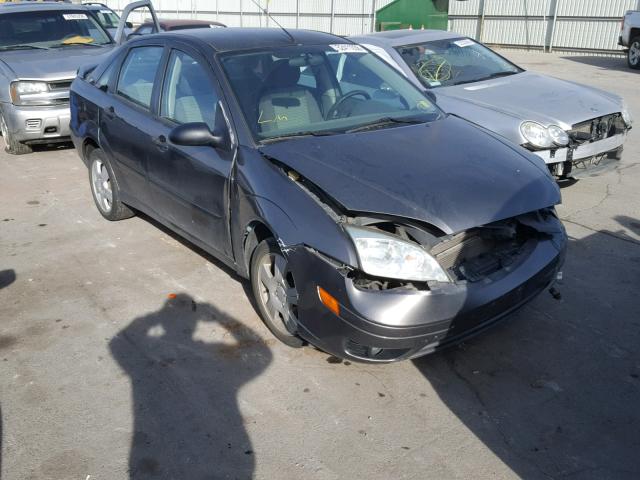 1FAFP34N85W135234 - 2005 FORD FOCUS ZX4 GRAY photo 1