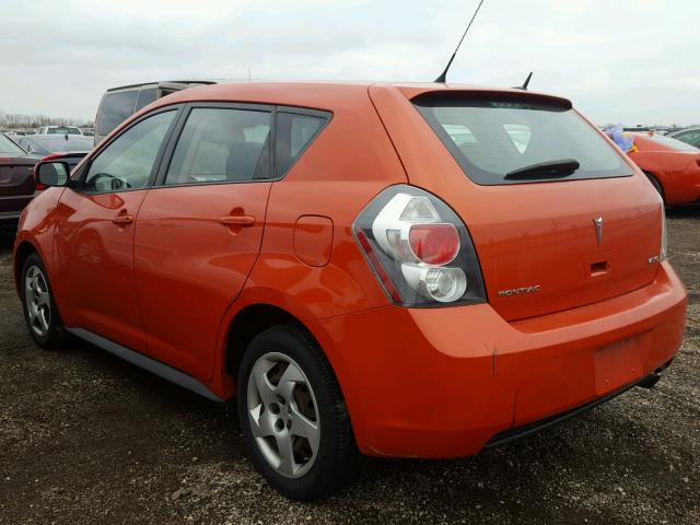 5Y2SL6E83AZ402044 - 2010 PONTIAC VIBE ORANGE photo 3