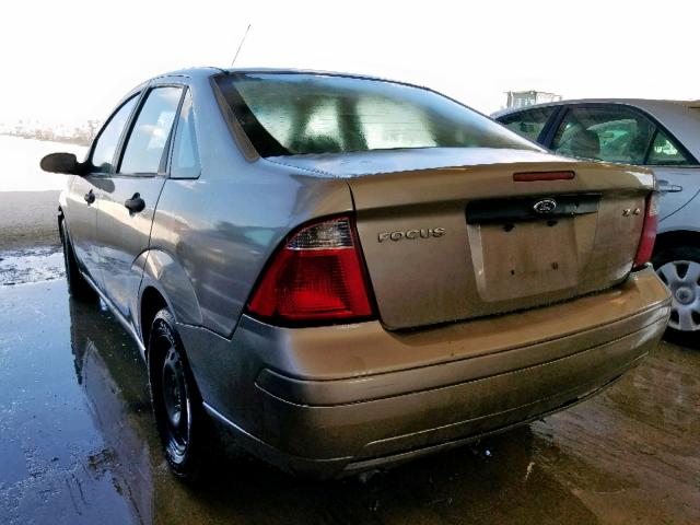 1FAFP34N95W126185 - 2005 FORD FOCUS ZX4 TAN photo 3