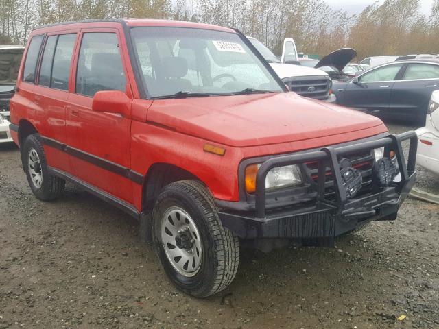 2S3TD03V7V6402123 - 1997 SUZUKI SIDEKICK J RED photo 1