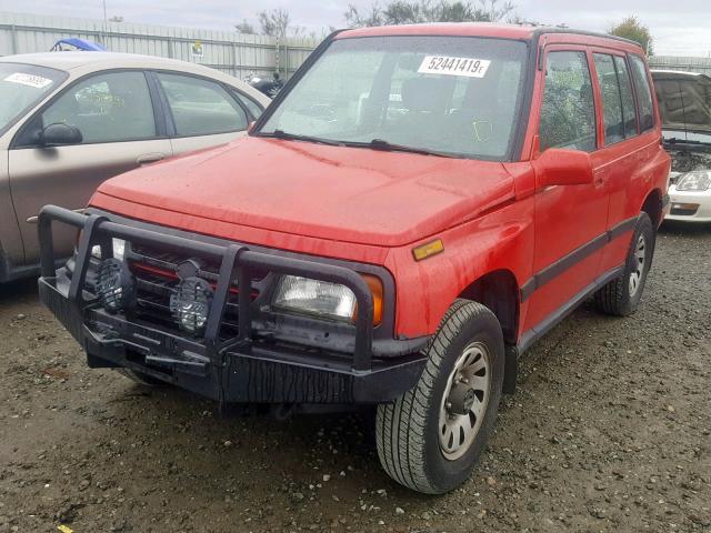 2S3TD03V7V6402123 - 1997 SUZUKI SIDEKICK J RED photo 2