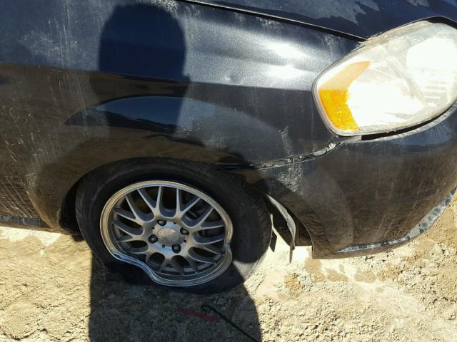 KL1TD5DE9BB187032 - 2011 CHEVROLET AVEO LS BLACK photo 9