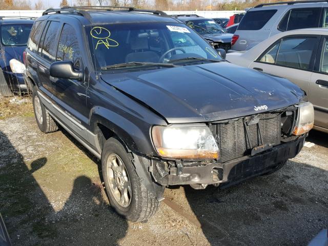 1J4GW58S0XC734799 - 1999 JEEP GRAND CHER GRAY photo 1