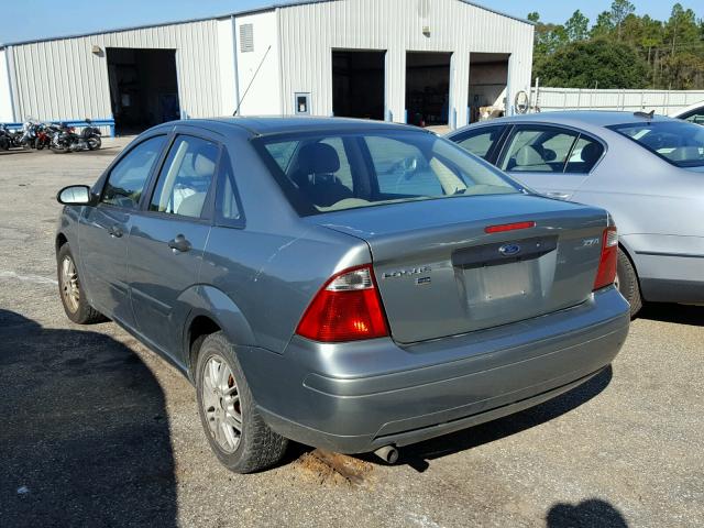 1FAFP34N65W142795 - 2005 FORD FOCUS ZX4 GREEN photo 3