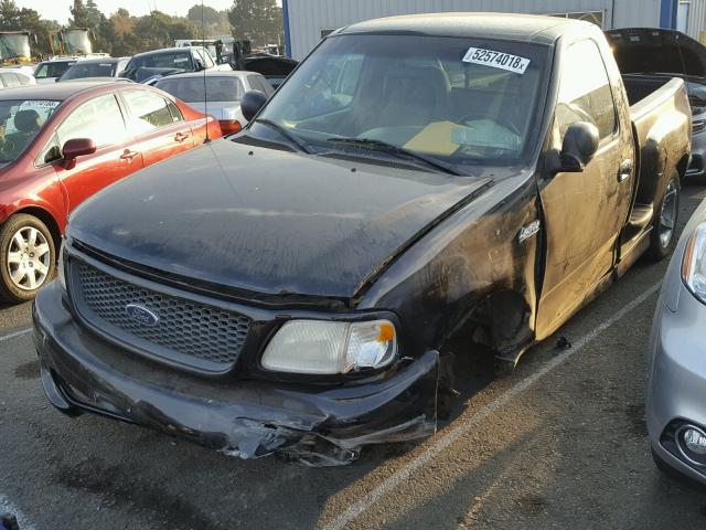 2FTZF0735XCB05318 - 1999 FORD F150 SVT L BLACK photo 2