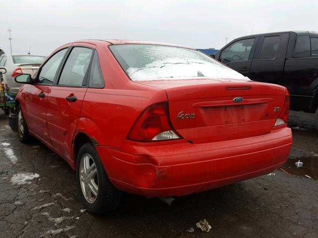 1FAFP38ZX4W154203 - 2004 FORD FOCUS ZTS RED photo 3