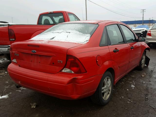 1FAFP38ZX4W154203 - 2004 FORD FOCUS ZTS RED photo 4