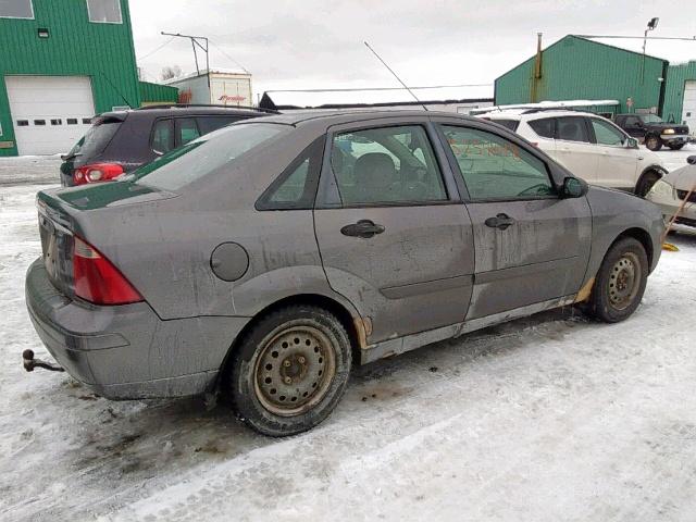 1FAFP34N67W144131 - 2007 FORD FOCUS ZX4 GRAY photo 4