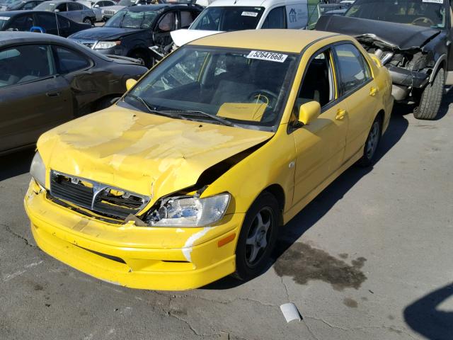 JA3AJ86E13U042871 - 2003 MITSUBISHI LANCER OZ YELLOW photo 2