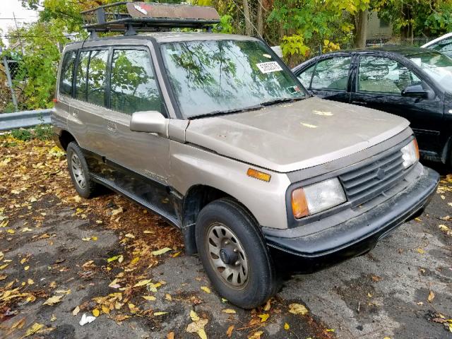 2S3TD03VXS6415489 - 1995 SUZUKI SIDEKICK J BROWN photo 1