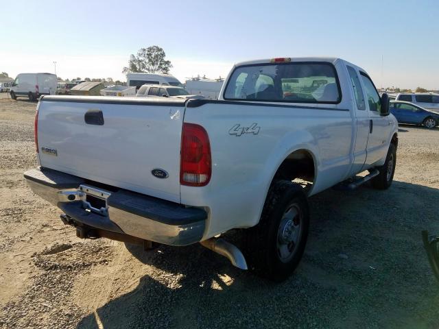 1FTWX31P65EC57175 - 2005 FORD F350 SRW S WHITE photo 4