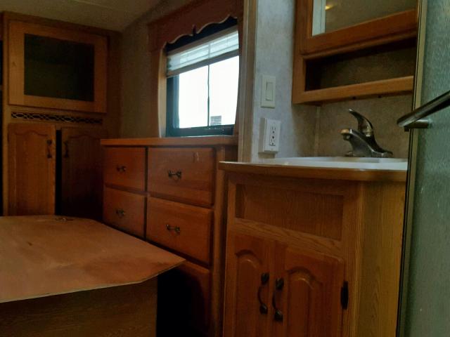 4YDF298205D515544 - 2005 KEYSTONE MONTANA WHITE photo 9