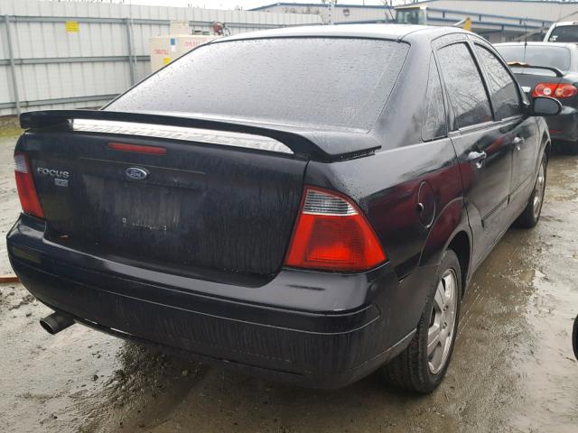 1FAHP34N97W364453 - 2007 FORD FOCUS ZX4 BLACK photo 4