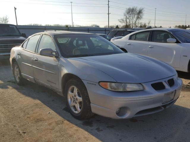 1G2WP52K8XF275581 - 1999 PONTIAC GRAND PRIX SILVER photo 1