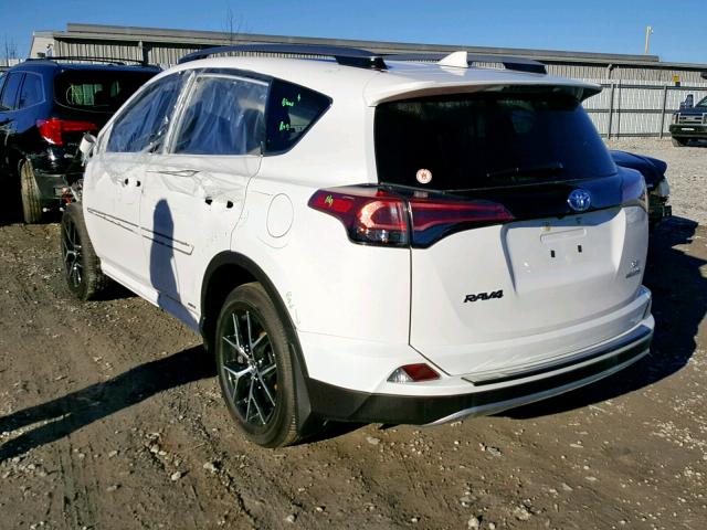 JTMJJREV4JD194875 - 2018 TOYOTA RAV4 HV SE WHITE photo 3