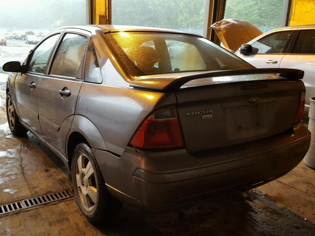 1FAFP34N37W306054 - 2007 FORD FOCUS ZX4 GRAY photo 3
