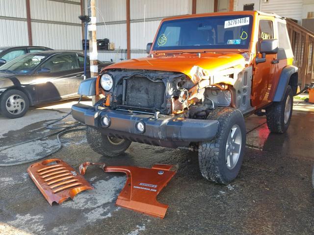 1J4GA2D14BL636832 - 2011 JEEP WRANGLER S ORANGE photo 2